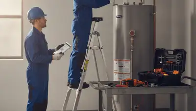 Emergency plumber repairing water heater in Marietta, GA for fast home service
